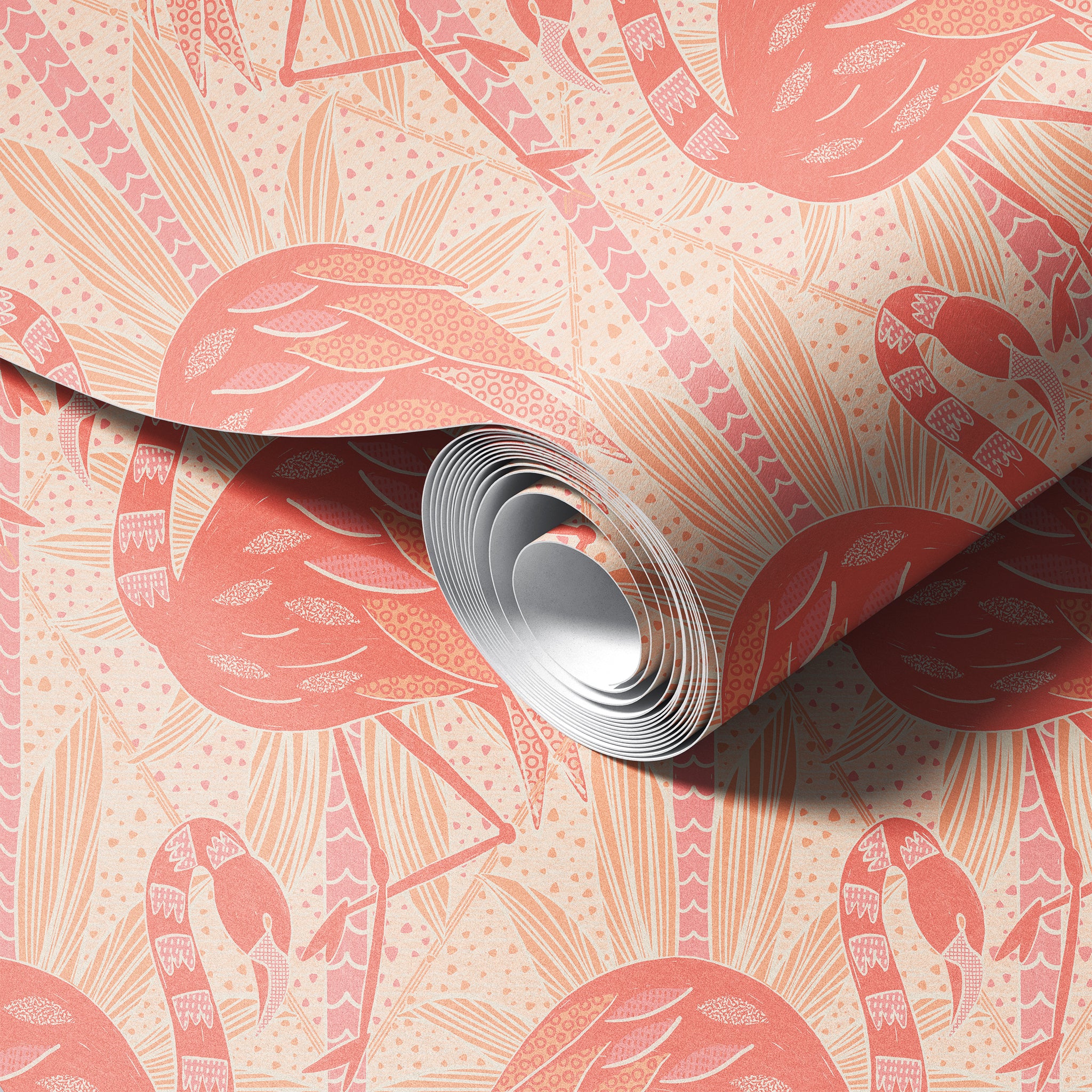 Roll of pink wallpaper with pink flamingos and a beige botanical background.